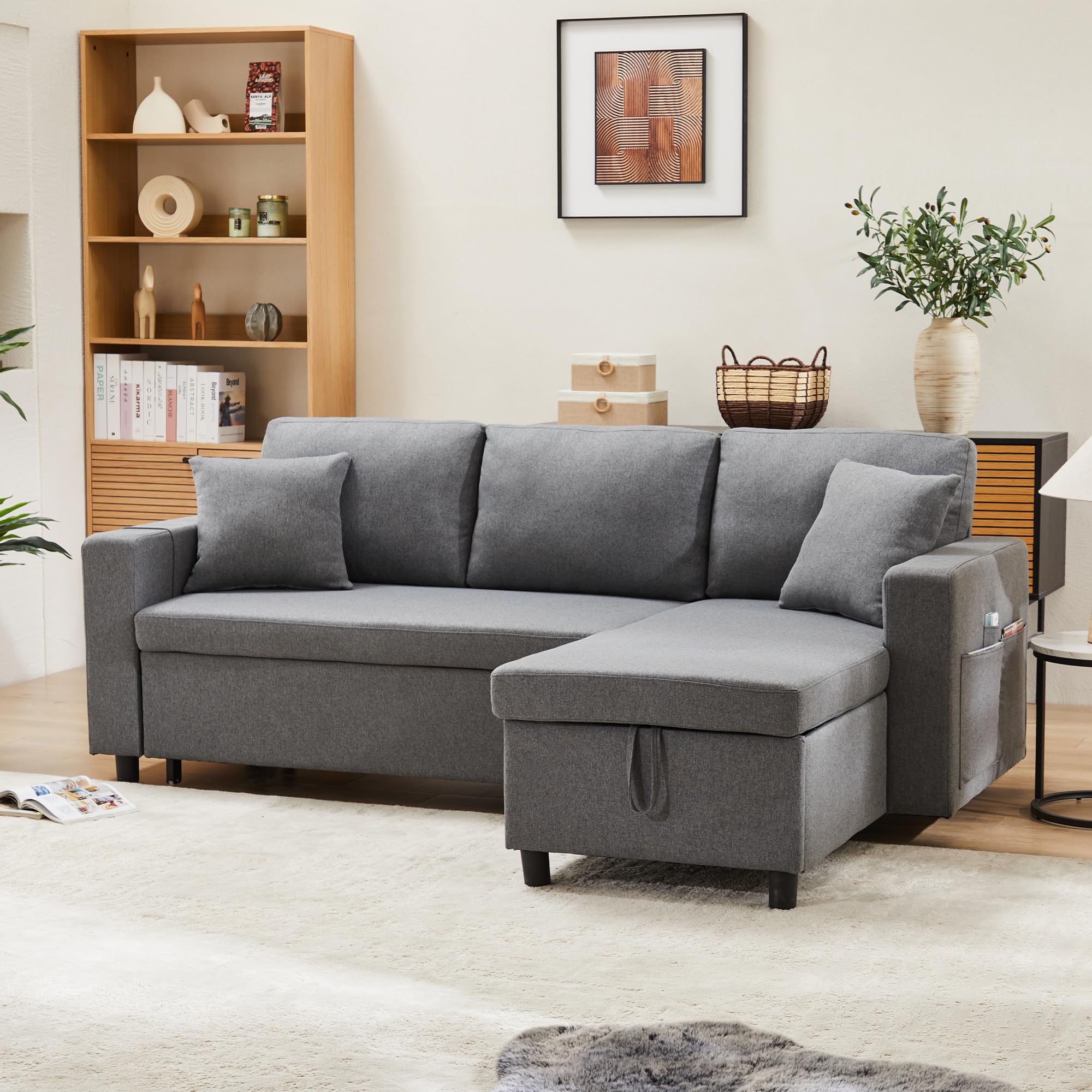 Sofá en L gris oscuro con cama y almacenamiento